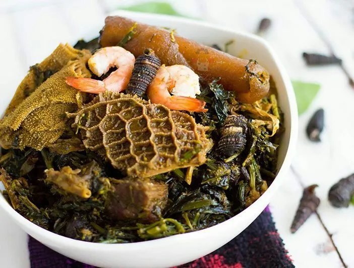 Pounded yam and egusi soup, traditional West African meal